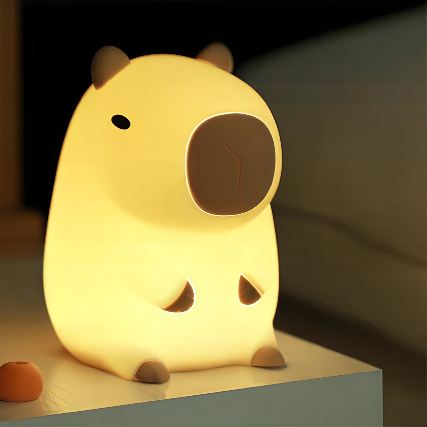 a capybara night light, made by BPA-free and silicone material, Tap to light. 